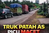 Kemacetan panjang terjadi di KM 67 Betung akibat truk patah as di jalur Palembang–Jambi. Arus balik Lebaran 2026 tersendat, sementara pengendara yang mendahului memperparah kondisi. Petugas kepolisian sigap turun tangan mengatur lalu lintas agar kembali lancar.